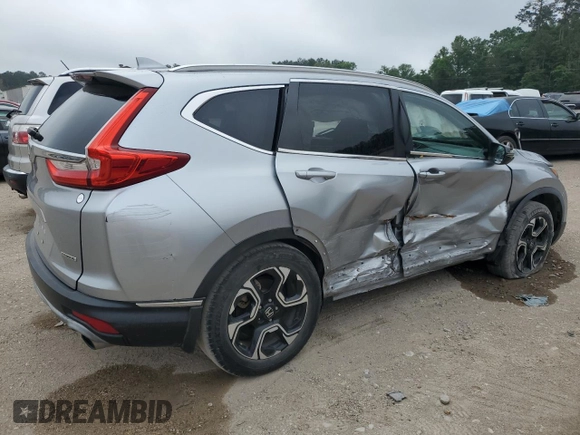 2018 Honda CR-V Touring with VIN 7FARW1H91JE039573, listed as a Copart auction lot 54144205 with 87,704 mi miles and Salvage Title. Bid and sale history available at DreamBid. Image 3.