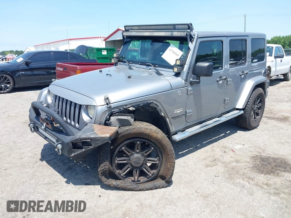 2013 Jeep Wrangler Unlimited Sahara with VIN 1C4BJWEG4DL666930, listed as a IAAI auction lot 42310569 with 206,577 mi miles and . Bid and sale history available at DreamBid. Image 17.