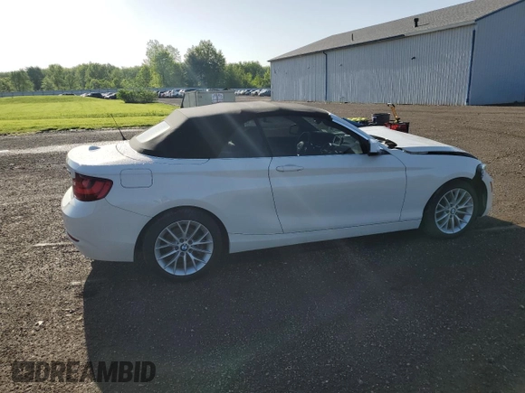 2015 BMW 2 Series 228i with VIN WBA1K5C51FV474079, listed as a Copart auction lot 57457875 with 62,946 mi miles and Salvage title. Bid and sale history available at DreamBid. Image 3.