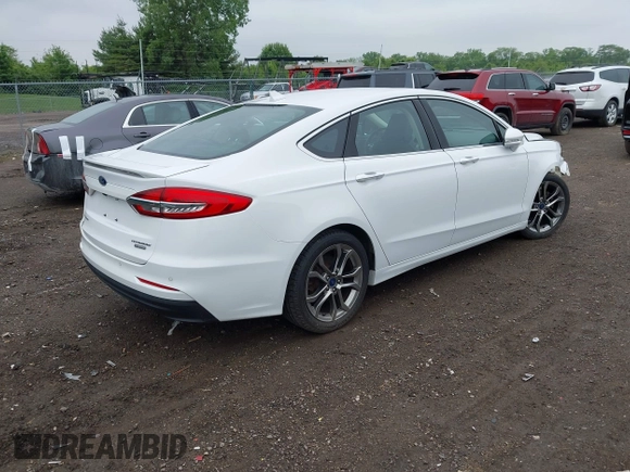 2020 Ford Fusion Titanium with VIN 3FA6P0RUXLR139574, listed as a IAAI auction lot 42299070 with 92,751 mi miles and . Bid and sale history available at DreamBid. Image 4.