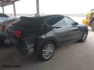 2019 Maserati Levante GranLusso with VIN ZN661XUL4KX321570, listed as a IAAI auction lot 41603682 with 120,085 mi miles. Bid and sale history available at carsss.com. Image 4.
