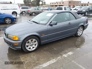 2001 BMW 3 Series 325Ci with VIN WBABS33431JY41788, listed as a IAAI auction lot 41557645 with 199,732 mi miles. Bid and sale history available at carsss.com. Image 2.