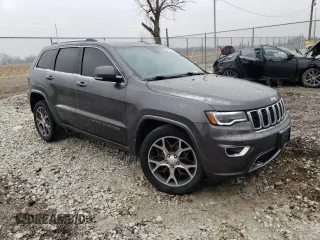 2018 Jeep Grand Cherokee Sterling Edition with VIN 1C4RJFBG8JC119562, listed as a Copart auction lot 44942405 with 125,726 mi miles and Salvage Title. Bid and sale history available at carsss.com. Image 4.