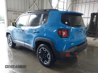2015 Jeep Renegade Trailhawk with VIN ZACCJBCT0FPB59264, listed as a IAAI auction lot 42203406 with 109,000 mi miles and . Bid and sale history available at DreamBid. Image 3.