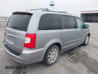 2014 Chrysler Town & Country Touring z VIN 2C4RC1BG1ER225443, wystawiony jako IAAI lot #42057326 z przebiegiem 142 997 mil mil oraz . Historia ofert i sprzedaży dostępna na DreamBid. Obrazek 4.