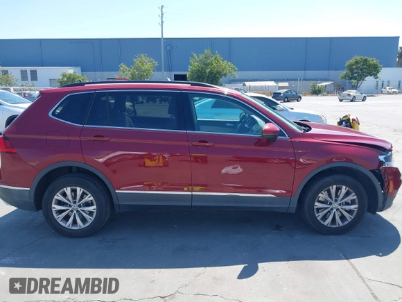 2018 Volkswagen Tiguan SEL z VIN 3VV3B7AX1JM214734, wystawiony jako IAAI lot #42473627 z przebiegiem 79 152 mil mil oraz . Historia ofert i sprzedaży dostępna na DreamBid. Obrazek 13.