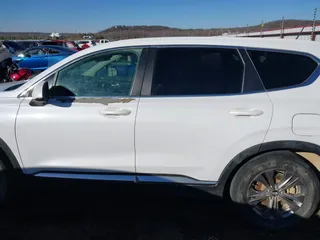 2019 Hyundai Santa Fe SE with VIN 5NMS2CAD2KH020288, listed as a IAAI auction lot 41398304 with 136,693 mi miles and . Bid and sale history available at DreamBid. Image 15.