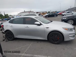 2018 Kia Optima S with VIN 5XXGT4L35JG216039, listed as a IAAI auction lot 42451216 with 91,679 mi miles and . Bid and sale history available at DreamBid. Image 13.