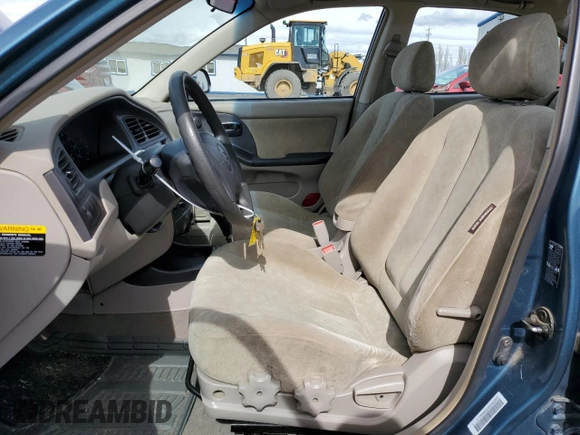2003 Hyundai Elantra GLS z VIN KMHDN45D03U468955, wystawiony jako Copart lot #50207515 z przebiegiem 123 560 mil mil oraz Czysty tytuł • Clean title. Historia ofert i sprzedaży dostępna na DreamBid. Obrazek 7.