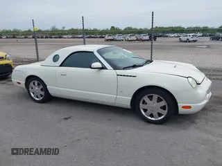 2003 Ford Thunderbird Deluxe with VIN 1FAHP60A03Y113355, listed as a IAAI auction lot 41890414 with 147,620 mi miles. Bid and sale history available at carsss.com. Image 13.