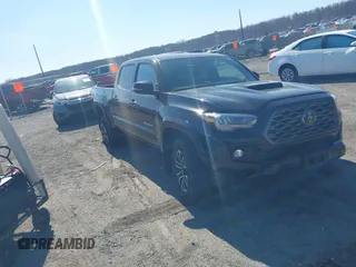 2023 Toyota Tacoma SR5 z VIN 3TMDZ5BN9PM146241, wystawiony jako IAAI lot #41768795 z przebiegiem 29 820 mil mil oraz . Historia ofert i sprzedaży dostępna na DreamBid. Obrazek 1.