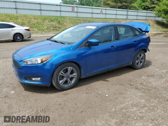 2018 Ford Focus SE with VIN 1FADP3FEXJL282378, listed as a Copart auction lot 59371975 with 30,029 mi miles and Salvage title. Bid and sale history available at DreamBid. Image 1.