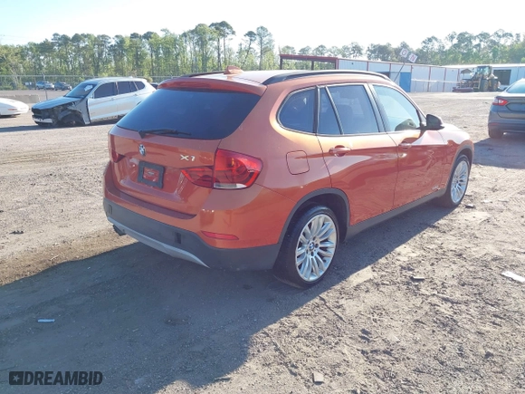 2013 BMW X1 28i with VIN WBAVM1C58DVW45105, listed as a IAAI auction lot 42049919 with 141,020 mi miles. Bid and sale history available at carsss.com. Image 4.