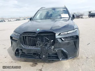 2025 BMW X7 xDrive40i with VIN 5UX23EM04S9X31373, listed as a IAAI auction lot 41429790 with 1,880 mi miles. Bid and sale history available at carsss.com. Image 12.