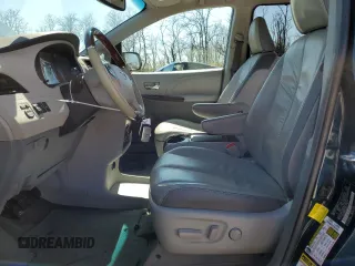 2011 Toyota Sienna XLE AAS with VIN 5TDYK3DC6BS170205, listed as a Copart auction lot 50868135 with 153,134 mi miles and Salvage Title. Bid and sale history available at DreamBid. Image 7.