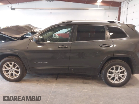 2016 Jeep Cherokee Latitude z VIN 1C4PJMCB3GW187502, wystawiony jako IAAI lot #42048898 z przebiegiem 151 450 mil mil oraz . Historia ofert i sprzedaży dostępna na DreamBid. Obrazek 14.