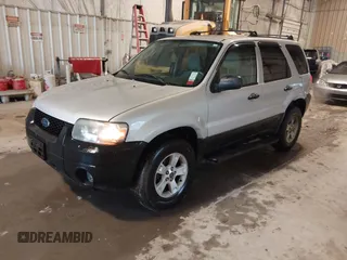 2006 Ford Escape XLT with VIN 1FMYU03196KA11342, listed as a IAAI auction lot 42237654 with 146,929 mi miles and . Bid and sale history available at DreamBid. Image 2.