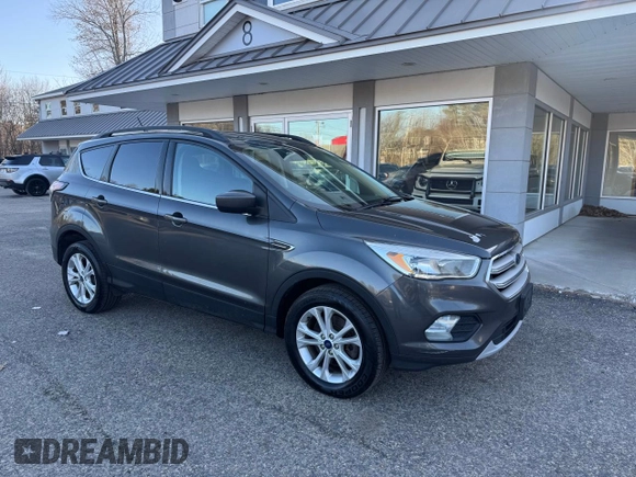2018 Ford Escape SE with VIN 1FMCU9GD8JUA76991, listed as a Copart auction lot 52815245 with 213,827 mi miles and Clean Title. Bid and sale history available at carsss.com. Image 1.