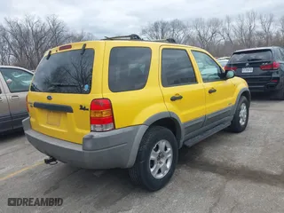2001 Ford Escape XLT with VIN 1FMYU04171KE58419, listed as a IAAI auction lot 41723939 with 176,759 mi miles. Bid and sale history available at carsss.com. Image 4.