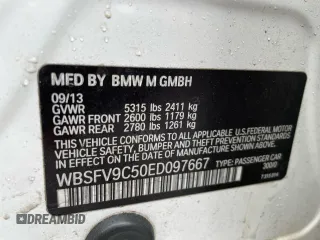 2014 BMW M5 z VIN WBSFV9C50ED097667, wystawiony jako Copart lot #55102255 z przebiegiem 145 086 mil mil oraz Tytuł czysty. Historia ofert i sprzedaży dostępna na DreamBid. Obrazek 10.