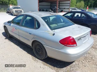 2005 Ford Taurus SE with VIN 1FAFP53U85A117320, listed as a IAAI auction lot 42121647 with 179,434 mi miles. Bid and sale history available at carsss.com. Image 6.