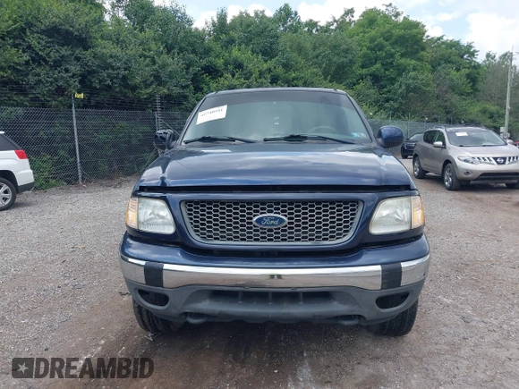 2003 Ford F-150 XLT with VIN 1FTRW08L73KB50541, listed as a IAAI auction lot 42740941 with 181,828 mi miles and . Bid and sale history available at DreamBid. Image 13.