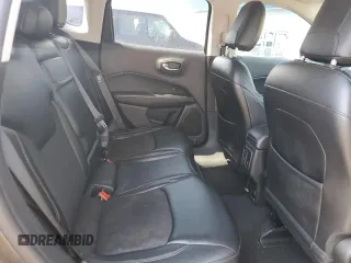 2018 Jeep Compass Latitude z VIN 3C4NJDBB5JT303871, wystawiony jako Copart lot #53881965 z przebiegiem 130 061 mil mil oraz Szkoda całkowita • Salvage title. Historia ofert i sprzedaży dostępna na DreamBid. Obrazek 11.