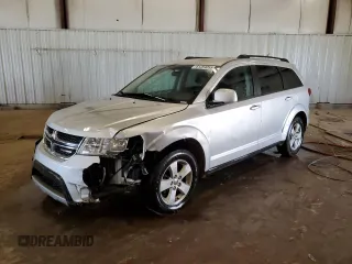 2012 Dodge Journey SXT z VIN 3C4PDCBG6CT143153, wystawiony jako Copart lot #61264055 z przebiegiem 170 007 mil mil oraz Czysty tytuł • Clean title. Historia ofert i sprzedaży dostępna na DreamBid. Obrazek 1.