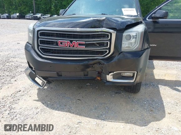 2015 GMC Yukon SLT with VIN 1GKS2BKC5FR275085, listed as a IAAI auction lot 42025693 with Not Provided miles. Bid and sale history available at carsss.com. Image 6.