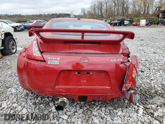 2009 Nissan 370Z z VIN JN1AZ44E19M400603, wystawiony jako Copart lot #79878474 z przebiegiem 129 976 mil mil oraz Szkoda całkowita • Salvage title. Historia ofert i sprzedaży dostępna na DreamBid. Obrazek 6.