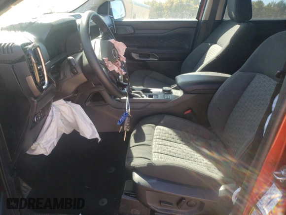 2024 Ford Ranger XLT with VIN 1FTER4HH3RLE11143, listed as a Copart auction lot 77126474 with 11,486 mi miles and Salvage Title. Bid and sale history available at carsss.com. Image 7.