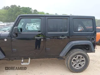 2015 Jeep Wrangler Unlimited Rubicon with VIN 1C4BJWFG7FL688728, listed as a IAAI auction lot 42054304 with 100,152 mi miles and . Bid and sale history available at DreamBid. Image 14.