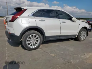 2021 Cadillac XT4 FWD Luxury z VIN 1GYAZAR49MF084676, wystawiony jako Copart lot #59765515 z przebiegiem 32 480 mil mil oraz Czysty tytuł • Clean title. Historia ofert i sprzedaży dostępna na DreamBid. Obrazek 3.