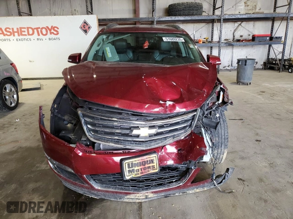 2015 Chevrolet Traverse LT z VIN 1GNKVHKD9FJ335101, wystawiony jako Copart lot #51689235 z przebiegiem 169 152 mil mil oraz Szkoda całkowita • Salvage title. Historia ofert i sprzedaży dostępna na DreamBid. Obrazek 5.