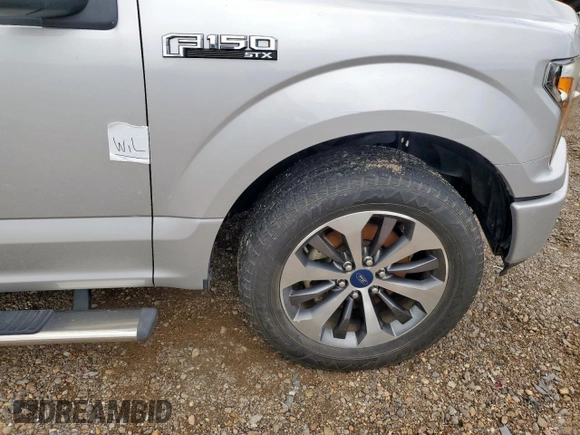 2019 Ford F-150 XL with VIN 1FTEW1C54KKF26298, listed as a Copart auction lot 62091785 with 108,889 mi miles and Salvage title. Bid and sale history available at DreamBid. Image 12.
