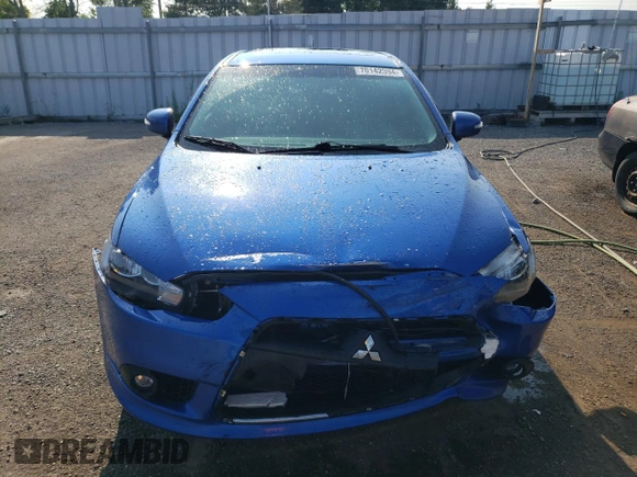 2015 Mitsubishi Lancer SE with VIN JA32V2FW3FU606202, listed as a Copart auction lot 70142394 with 129,336 mi miles and Salvage Title. Bid and sale history available at carsss.com. Image 5.