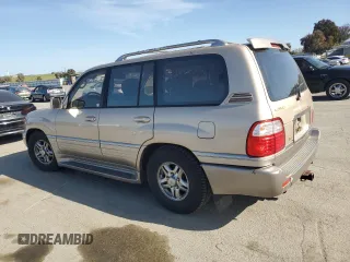 2001 Lexus LX 470 z VIN JTJHT00W213507042, wystawiony jako Copart lot #52634195 z przebiegiem 179 707 mil mil oraz Tytuł czysty. Historia ofert i sprzedaży dostępna na DreamBid. Obrazek 2.