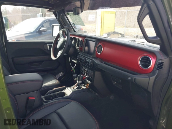 2023 Jeep Gladiator Rubicon with VIN 1C6JJTBGXPL586154, listed as a IAAI auction lot 41370352 with 11,207 mi miles and . Bid and sale history available at DreamBid. Image 5.