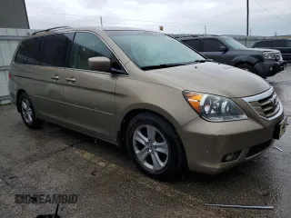 2009 Honda Odyssey Touring с VIN 5FNRL38929B048214, выставлен на аукционе Copart как лот 56735165 с пробегом 158 532 миль миль и Чистый • Clean title. История ставок и продаж доступна на DreamBid. Изображение 4.
