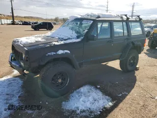 1990 Jeep Cherokee z VIN 1J4FJ28L1LL100736, wystawiony jako Copart lot #81339574 z przebiegiem 160 363 mil mil oraz Czysty tytuł • Clean title. Historia ofert i sprzedaży dostępna na DreamBid. Obrazek 1.