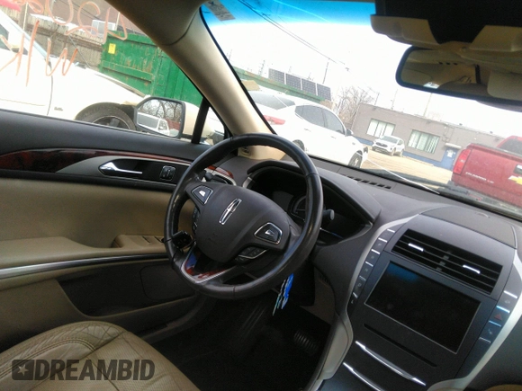 2014 Lincoln MKZ Hybrid with VIN 3LN6L2LU2ER805061, listed as a IAAI auction lot 42022156 with Not provided miles and . Bid and sale history available at DreamBid. Image 5.