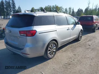 2016 Kia Sedona SX with VIN KNDMC5C19G6140582, listed as a IAAI auction lot 42086075 with 112,474 mi miles. Bid and sale history available at carsss.com. Image 4.