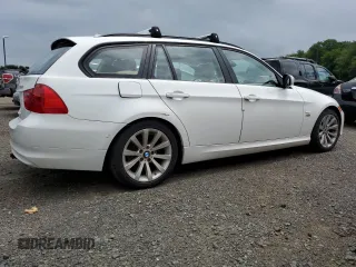 2011 BMW 3 Series 328i xDrive with VIN WBAUU3C5XBA542974, listed as a Copart auction lot 63331535 with 276,912 mi miles and Salvage title. Bid and sale history available at DreamBid. Image 3.