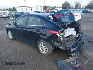 2022 Hyundai Accent SE with VIN 3KPC24A61NE170710, listed as a IAAI auction lot 40869215 with 28,459 mi miles. Bid and sale history available at carsss.com. Image 3.