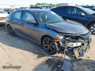 2018 Honda Civic Hatchback Sport Touring with VIN SHHFK7H93JU239785, listed as a IAAI auction lot 41637098 with 65,277 mi miles. Bid and sale history available at carsss.com. Image 1.