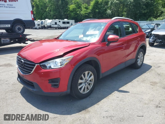 2016 Mazda CX-5 Sport with VIN JM3KE4BY3G0765905, listed as a Copart auction lot 61874165 with 134,546 mi miles and Salvage title. Bid and sale history available at DreamBid. Image 1.