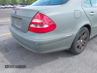 2003 Mercedes-Benz E-Class 3.2L with VIN WDBUF65J83A124342, listed as a IAAI auction lot 41951596 with 185,094 mi miles. Bid and sale history available at carsss.com. Image 6.