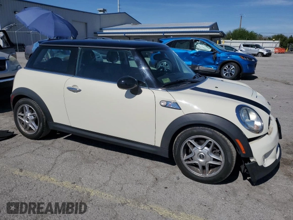 2009 MINI Hardtop S with VIN WMWMF73559TW83208, listed as a Copart auction lot 57347015 with 76,898 mi miles and Salvage title. Bid and sale history available at DreamBid. Image 4.