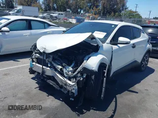 2019 Toyota C-HR XLE z VIN JTNKHMBX2K1049065, wystawiony jako IAAI lot #42226727 z przebiegiem 63 818 mil mil oraz . Historia ofert i sprzedaży dostępna na DreamBid. Obrazek 2.