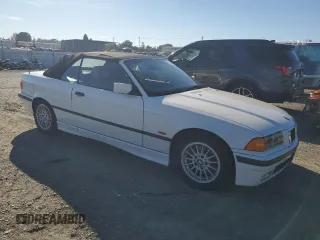 1997 BMW 3-Series 328IC with VIN WBABK8324VET96407, listed as a Copart auction lot 79532034 with 143,934 mi miles and Clean Title. Bid and sale history available at carsss.com. Image 4.